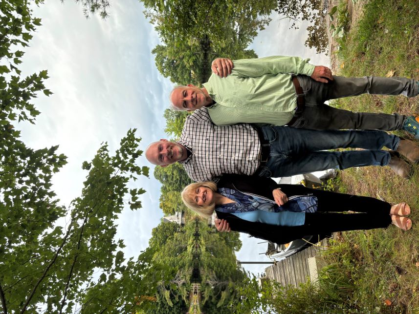 Eileen and Tony with State Senate candidate Stu Green in front of Lake Todd.