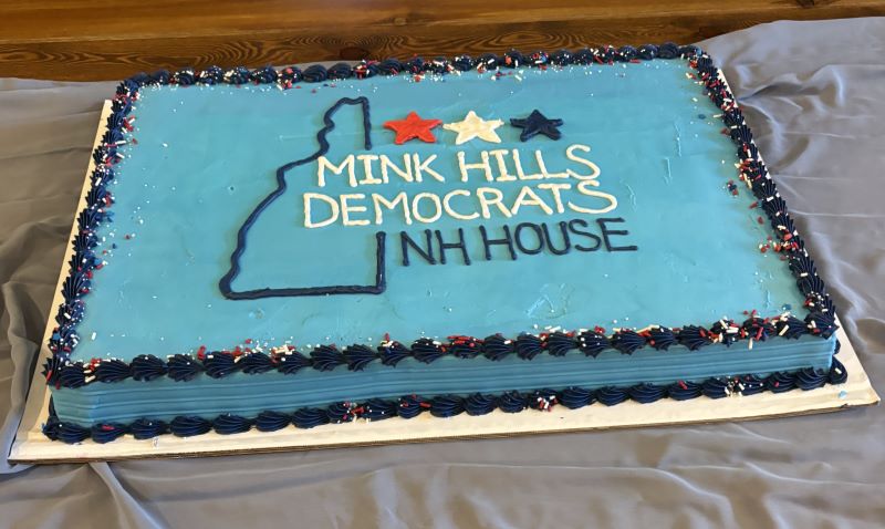 The delicious cake from our Colby Hill Inn event, showing the Mink Hills Democrats logo.