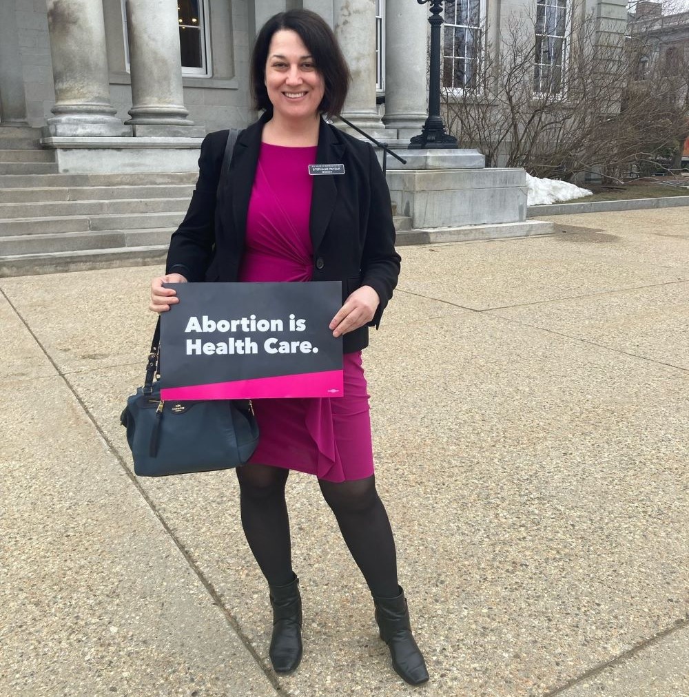 Stephanie shows her support for protecting reproductive care outside the statehouse.